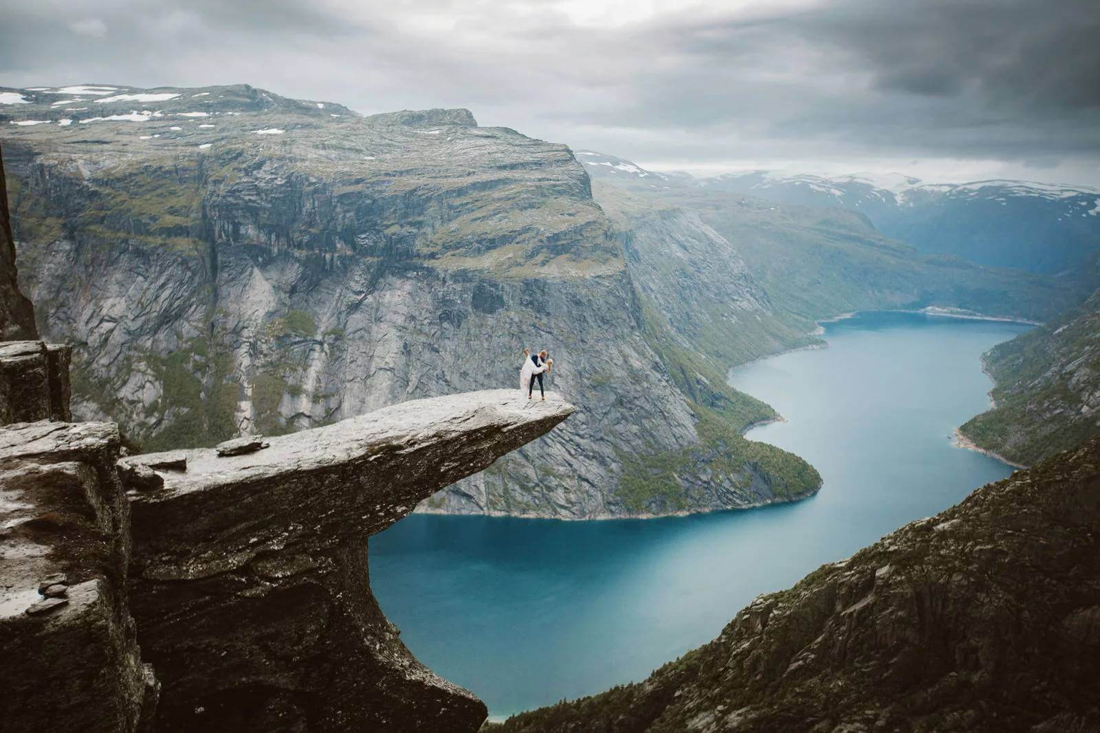 Epic Wedding Photos On Top Of Trolltunga After 14 Hours Hike By