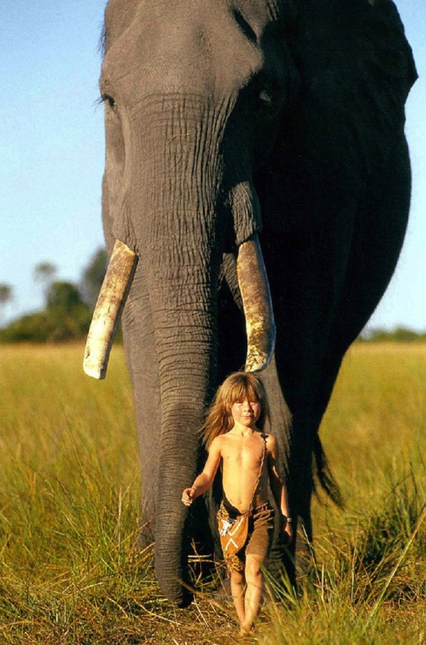 Young girl who’s best friends with African wildlife