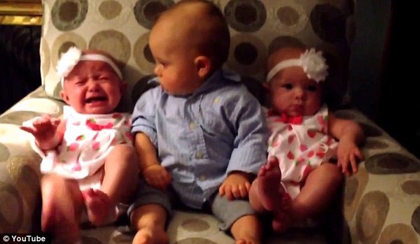 baby meets twin sisters for the first time