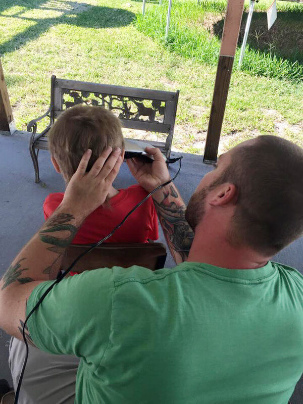 boy cuts long hair for cancer wigs 4