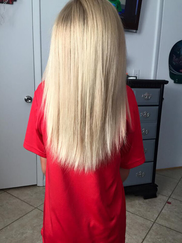 boy cuts long hair for cancer wigs 2