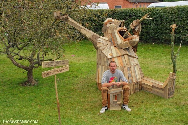 giant sculptures created from scrap wood 12