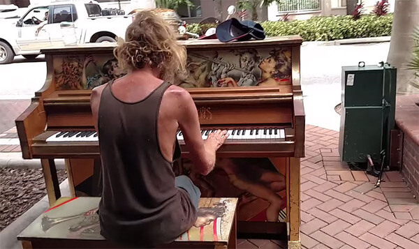 homeless man plays piano 2