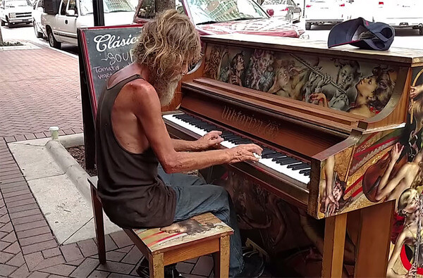 homeless man plays piano 3