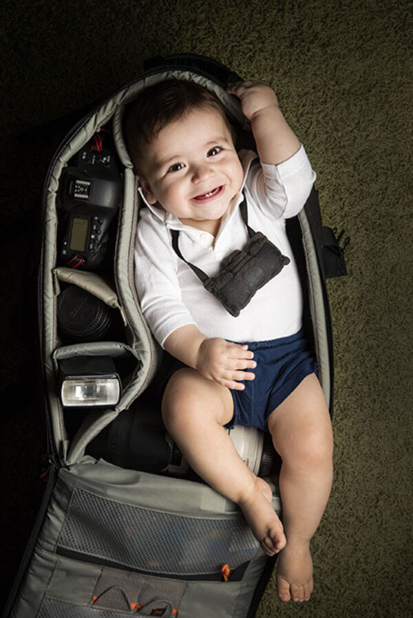 portraits of babies in camera bags 5