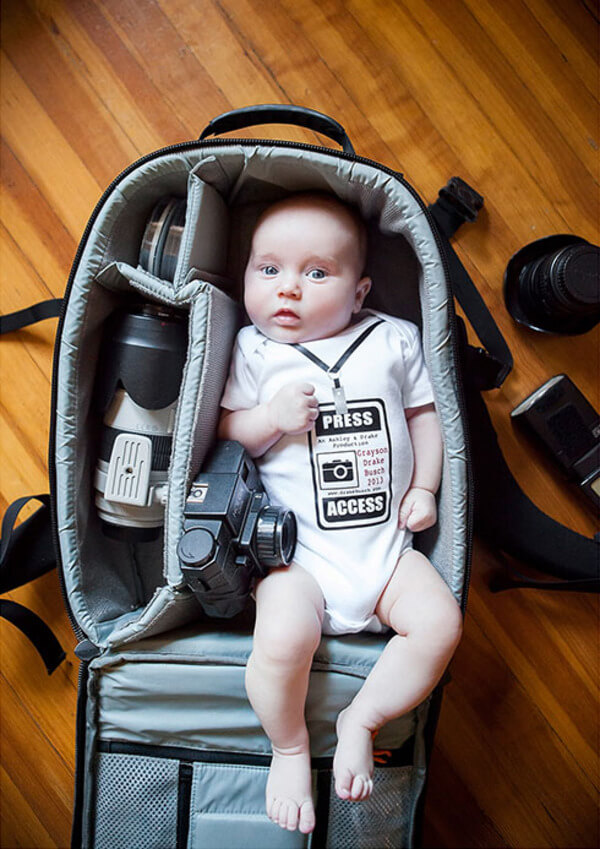 portraits of babies in camera bags 3