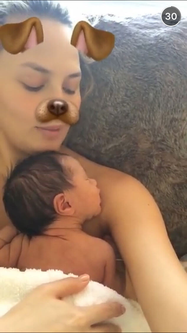 Chrissy Teigen Cuddles Baby Luna 9 (1)