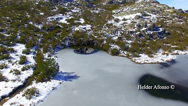 waterfall inside lake portugal (1)