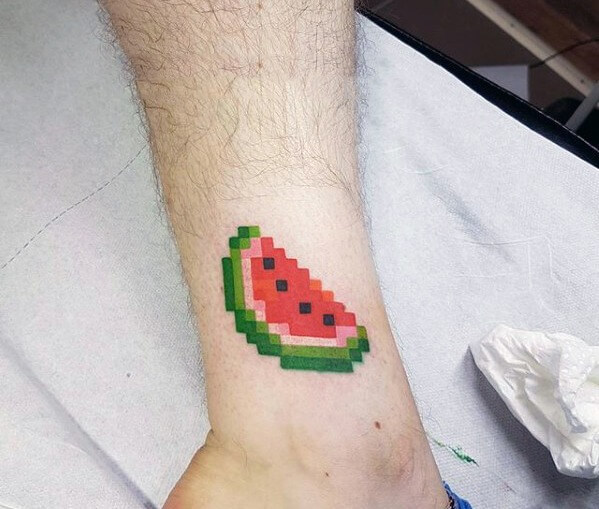 59 Pixel Tattoo Designs That Remind Us How Much We Love Video Games