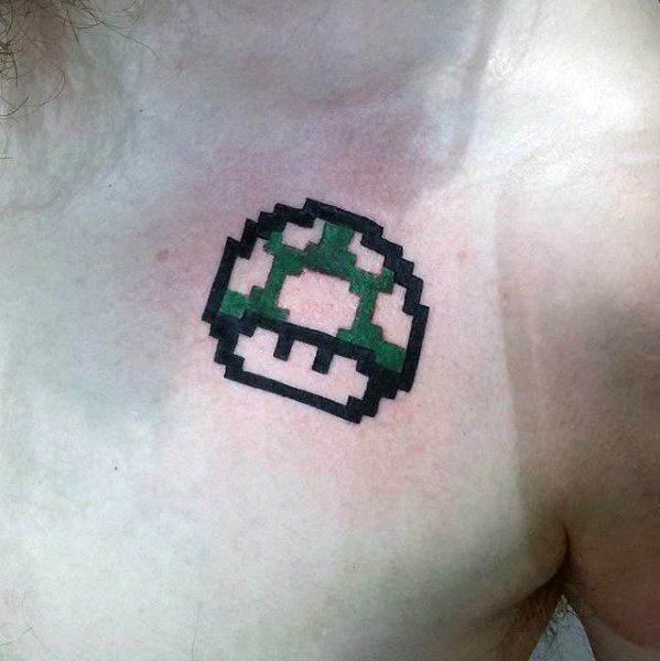 59 Pixel Tattoo Designs That Remind Us How Much We Love Video Games