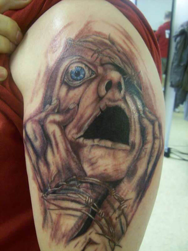 33 Scary Tattoos That Are So Creepy They Will Haunt Your Dreams