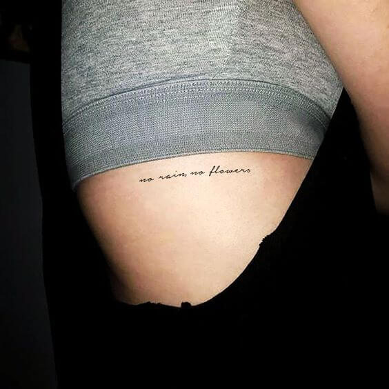 ribs tattoo of text